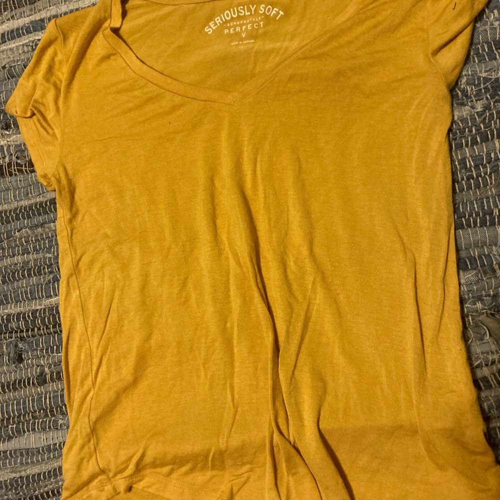 Two stretchy V neck  shirts